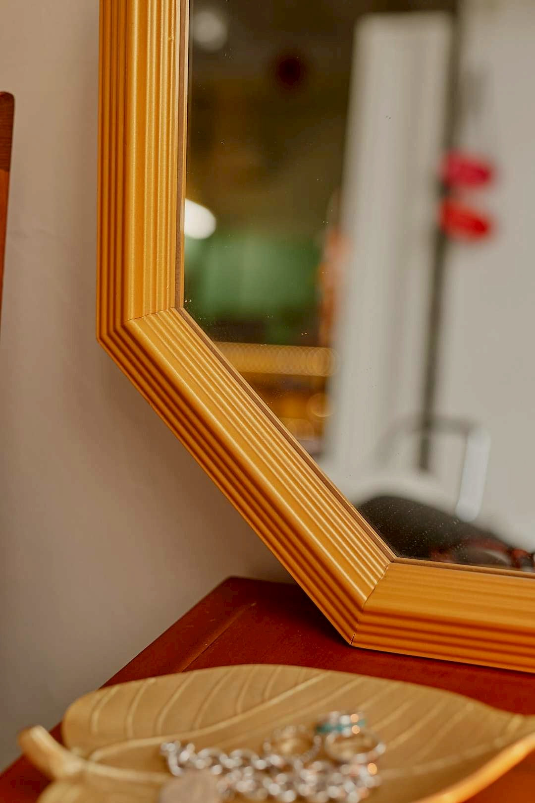 Octagonal gold mirror