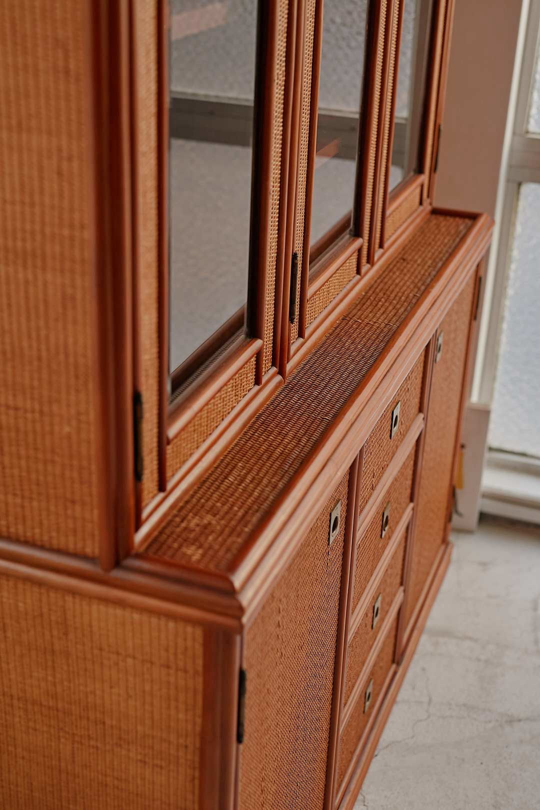 Hand woven rattan cupboard