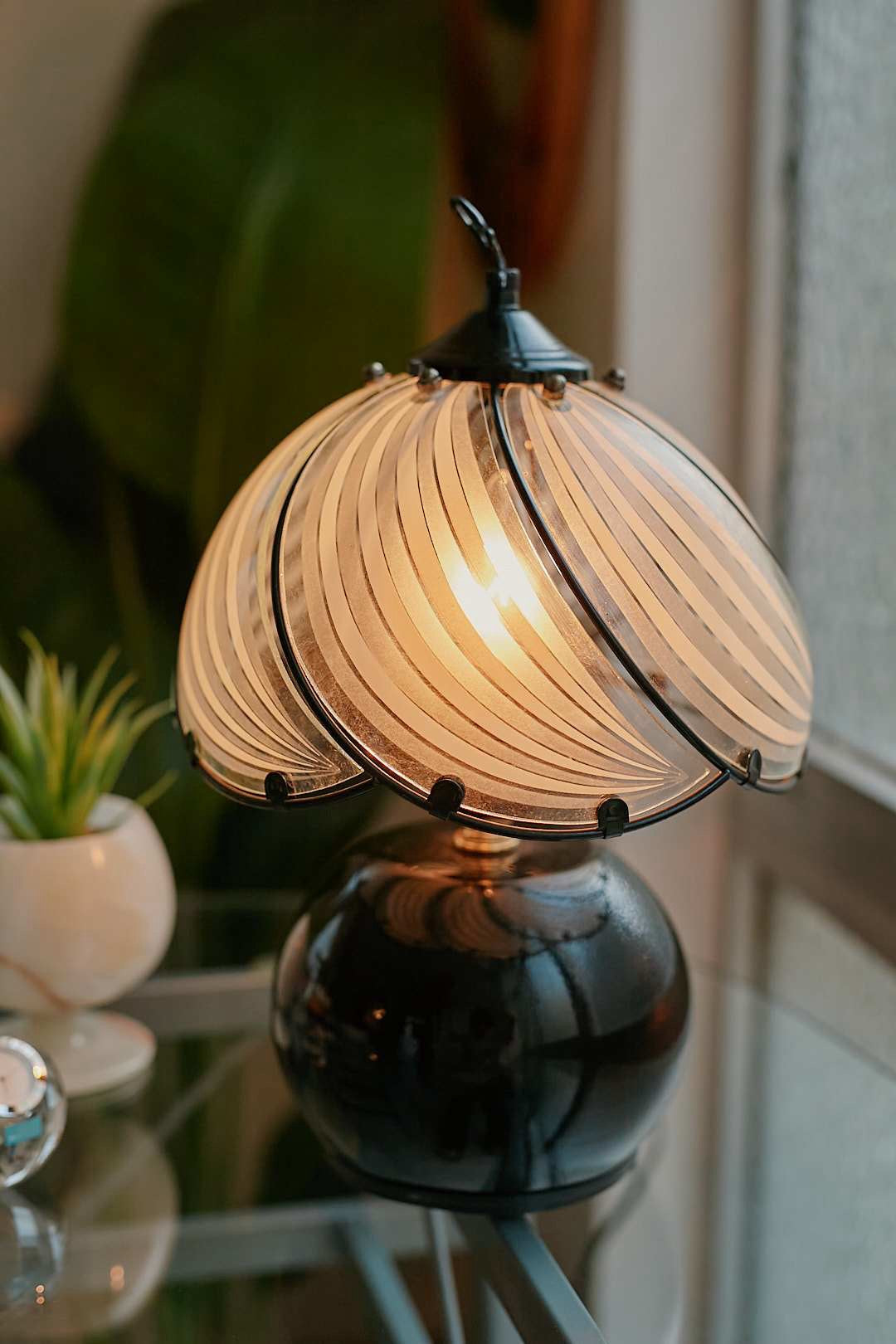 Black spherical touch-sensor lamp