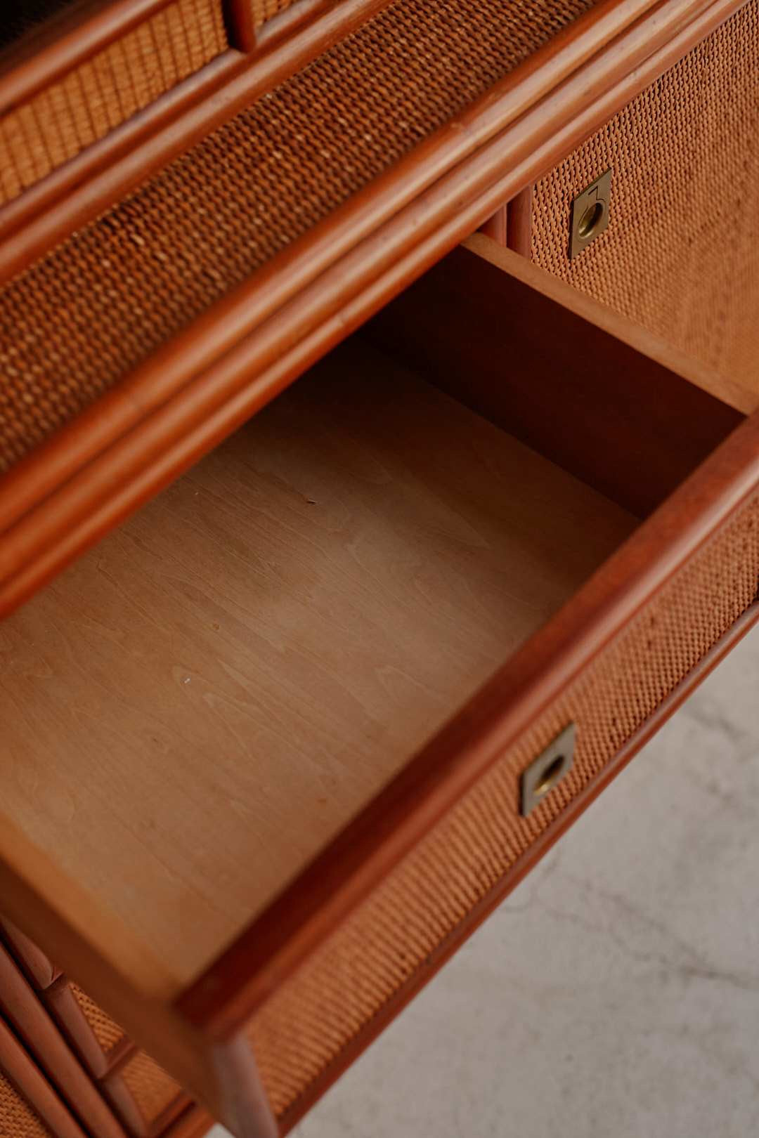 Hand woven rattan cupboard