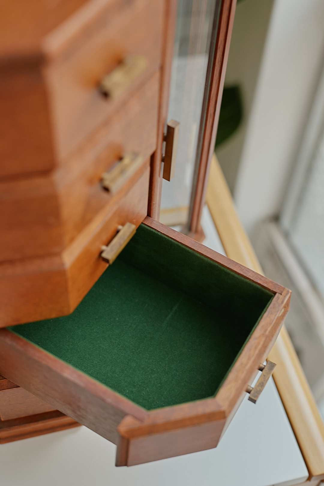 Glass door jewelry cabinet