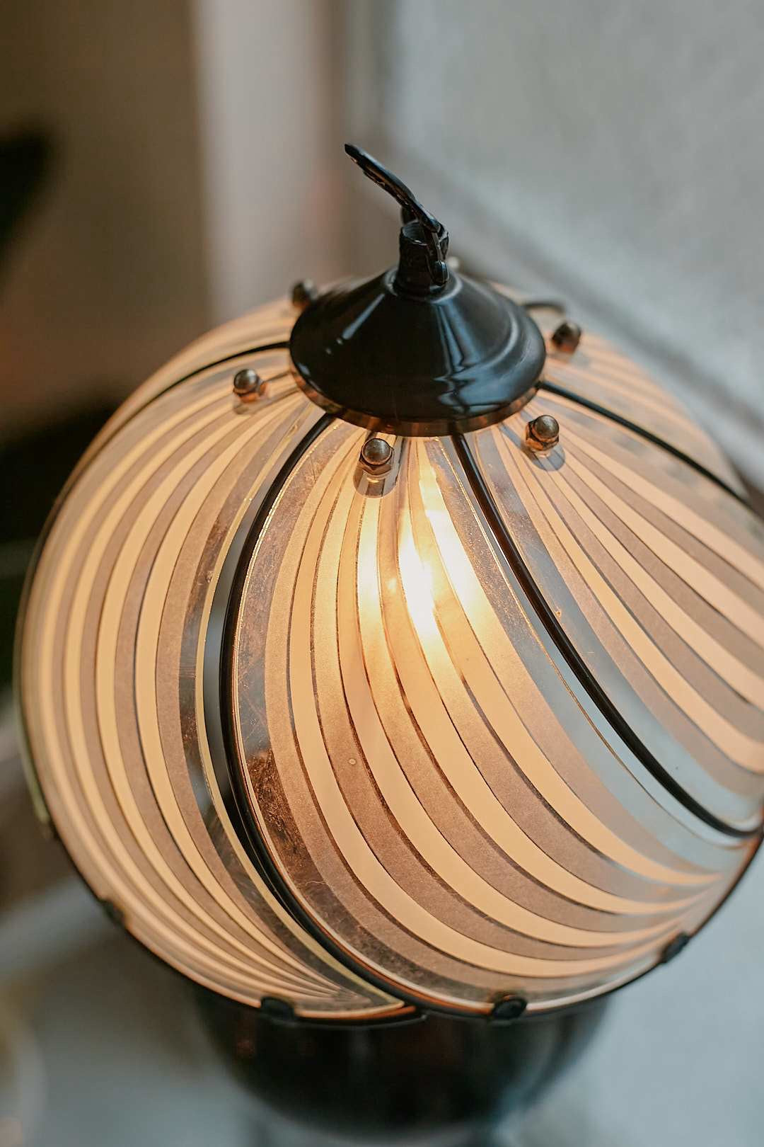 Black spherical touch-sensor lamp