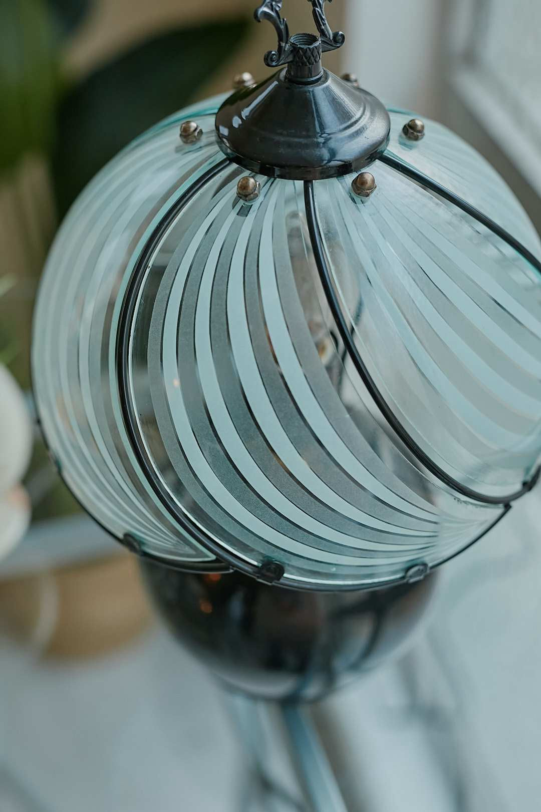 Black spherical touch-sensor lamp
