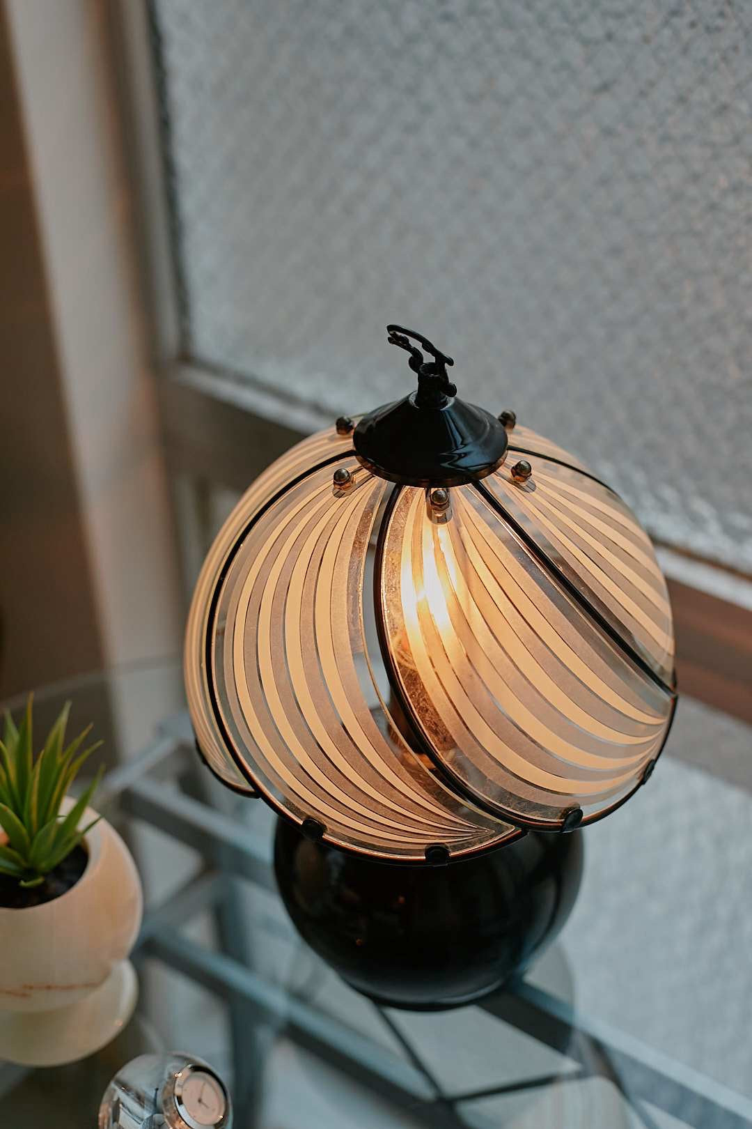 Black spherical touch-sensor lamp