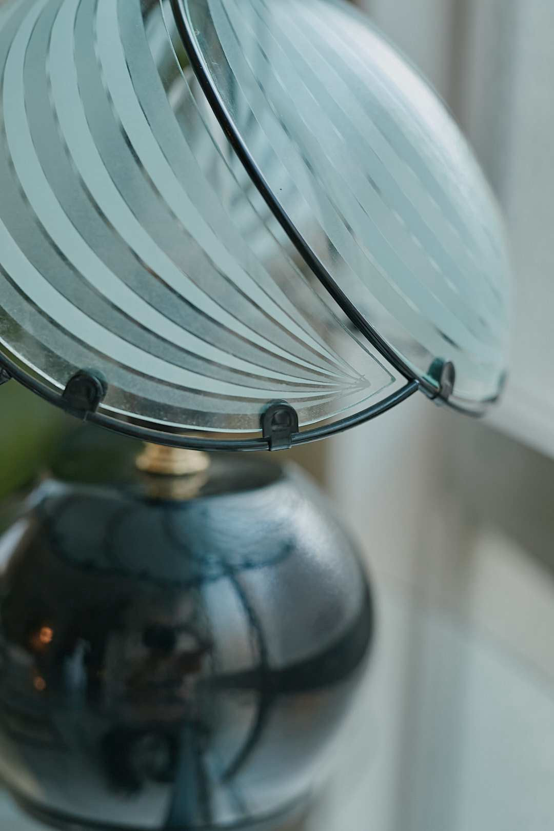 Black spherical touch-sensor lamp