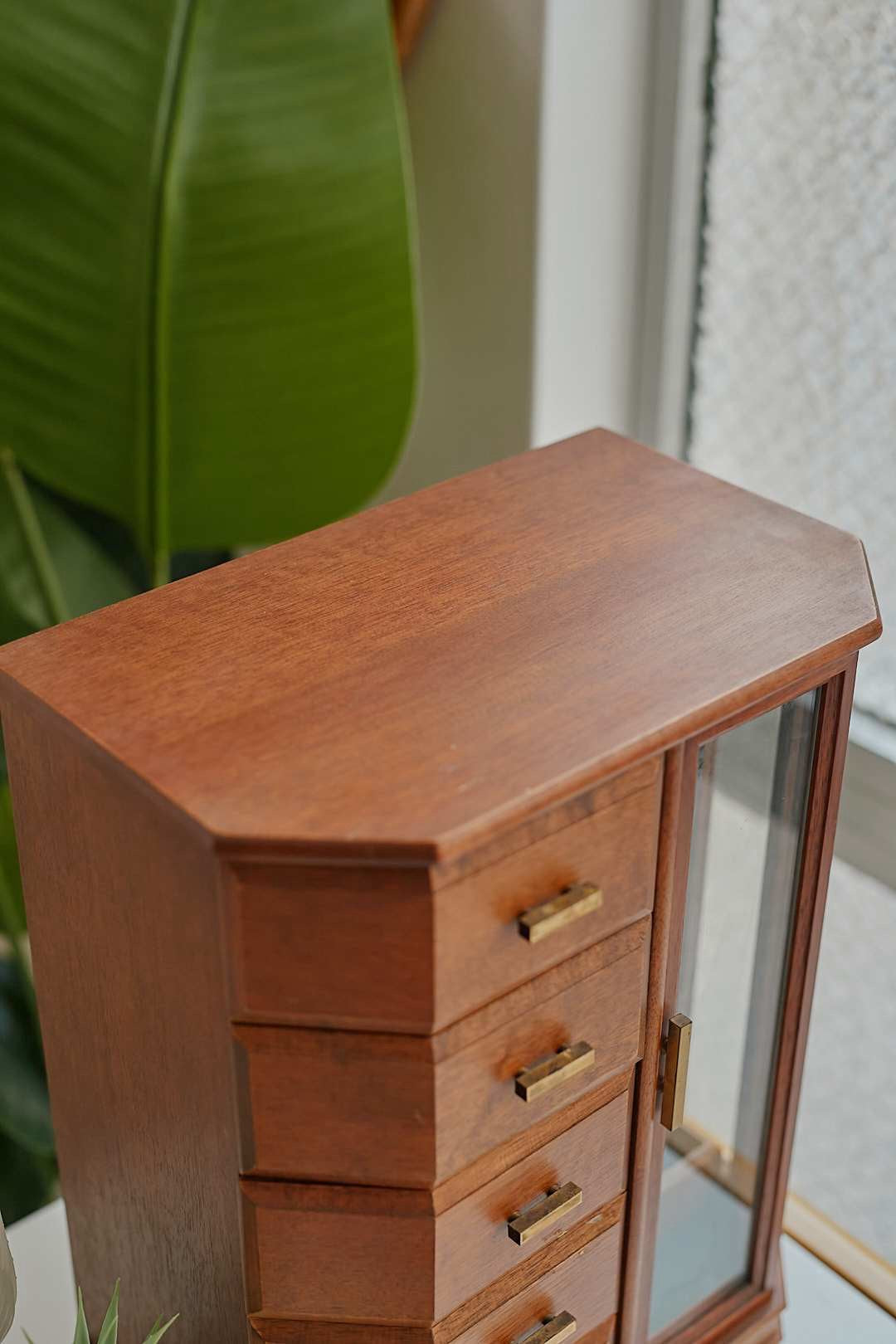 Glass door jewelry cabinet