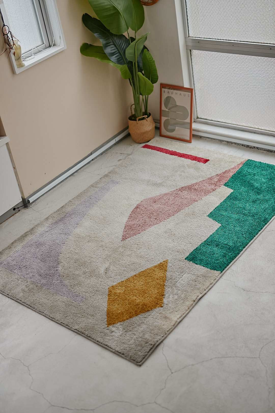 unico 幾何学アートラグ