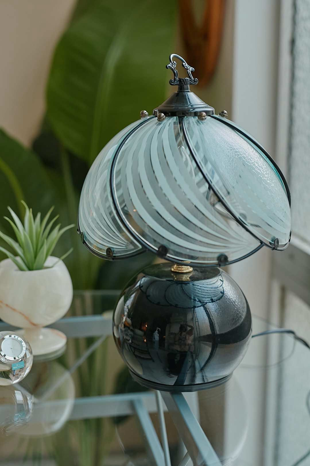 Black spherical touch-sensor lamp